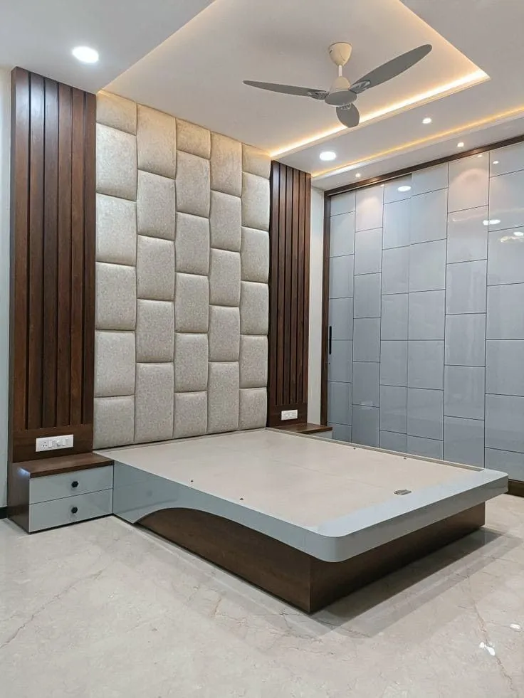 Luxurious customized living room wall paneling by Baba Interiors